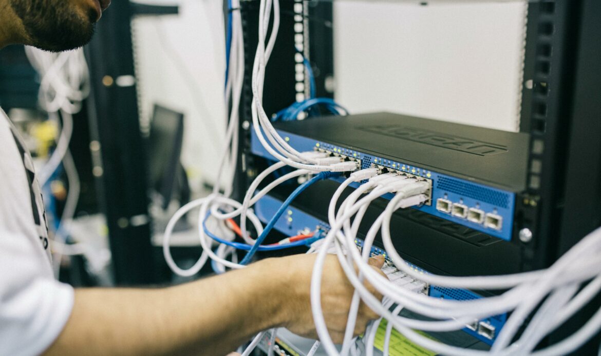 Data center security guard working with data center engineer